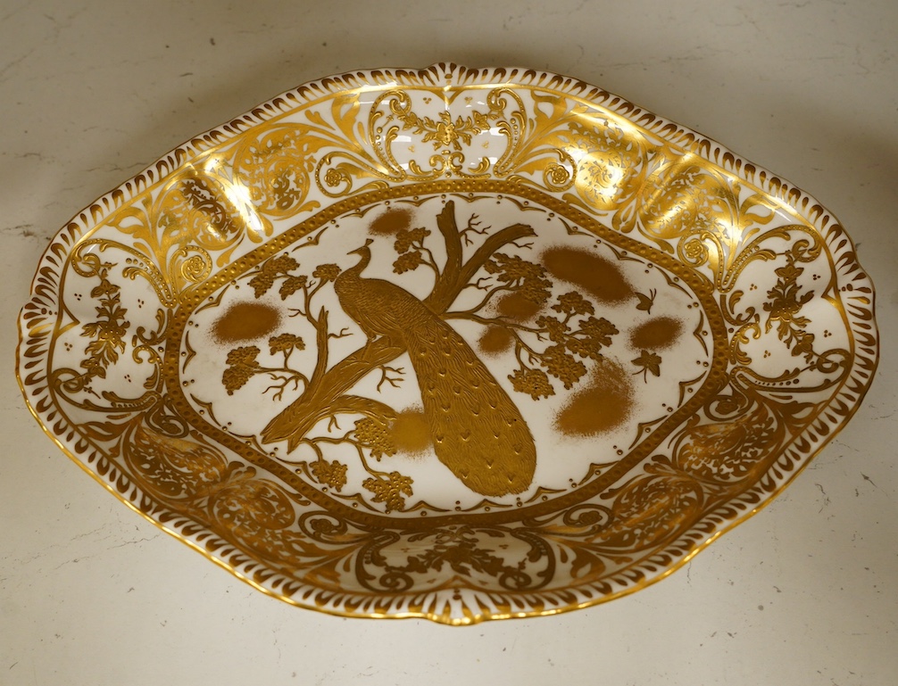 A Crown Derby gold Aves dessert dish with raised design, 28cm wide. Condition - fair to good, some wear to surface